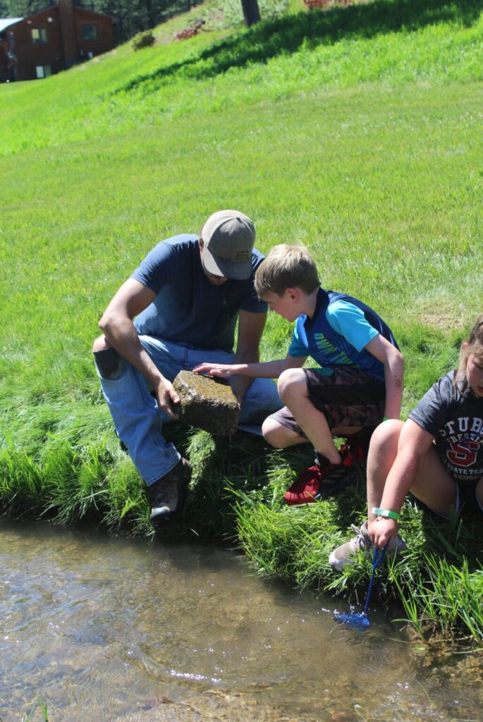 Children learning about natural resources at Black Hills Natural Resource Youth Camp