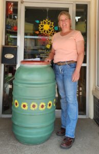 Jen Womack with her barrel, "Sunflowers in Bloom"