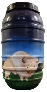 A rain barrel painted with a night sky and white buffalo