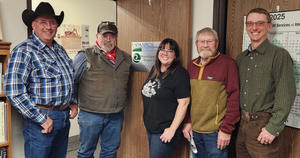 Board members David Tysdal, Tom Streeter, Emily Hartinger, Gene Norman, and Tucker Hamilton