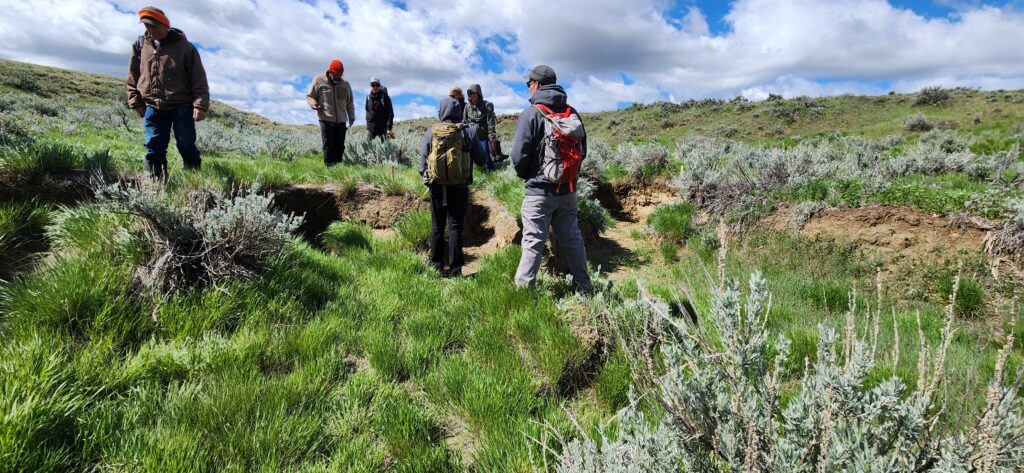 Participants viewing and discussing project locations