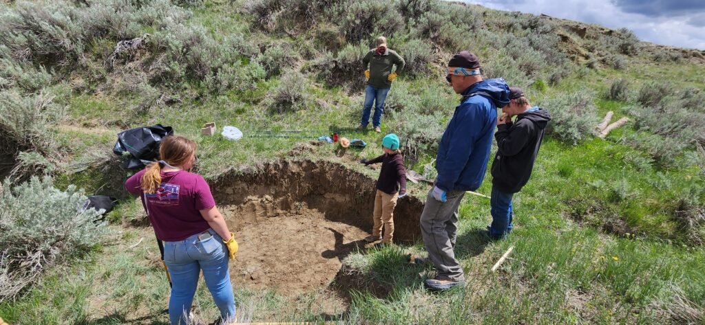 Digging out the base of the headcut for the log and fabric structure