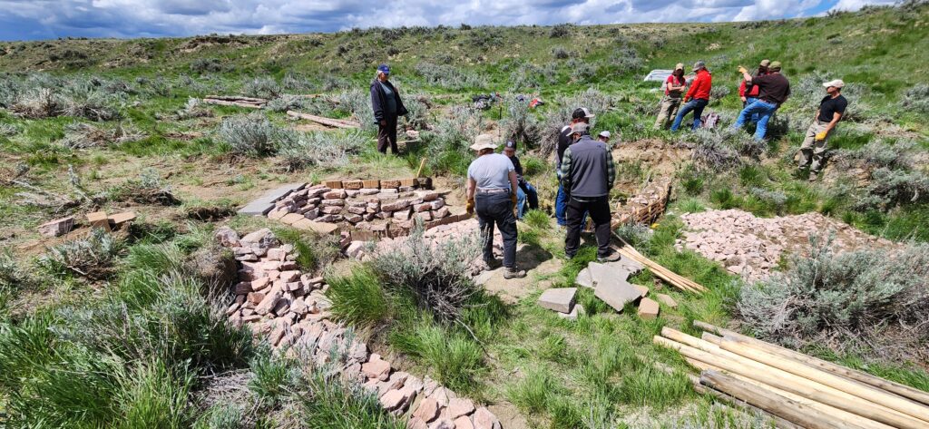 Rock rundown and modified zuni bowl structure built in place of a headcut